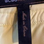 BCBGMAXAZRIA  yellow ruffle front tie back M dress. Photo 3