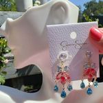 Jessica Simpson  gold tone teardrop bow tie crystal pink blue tassel earrings Photo 4