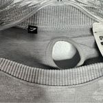 Gymshark  gray cropped top size medium Photo 7