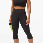 Lululemon Invigorate $118 HR Crop 17” Black Size 4 • Photo 0