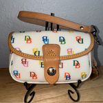 Dooney & Bourke VINTAGE WHITE MULTI COATED CANVAS SNAP LEATHER WRISTLET Photo 0