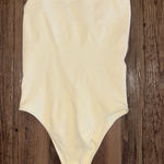 Cream colored one shoulder bodysuit Yellow Photo 0
