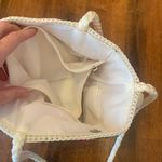 Lina Shoulder Bag Colorful Rainbow Stripe Crochet with Floral Pin Zipper Pull Red Photo 8