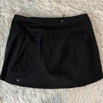 Athleta  RUN WITH IT 14” SKORT JUPE-SHORT Size Medium Photo 1