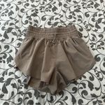 Abercrombie & Fitch Abercrombie YPB your personal best tan beige athletic shorts size XS Photo 0