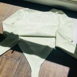 Divided Long Sleeve Powder Green Bodysuit Photo 3