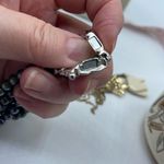 Boutique Three strand faux pearl layered necklace. Adjustable and easy. Photo 5