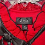 B. Wear  Red Ruffle Blouse Photo 5