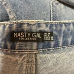 Nasty Gal “Cut-Out of This World” High-Waisted Mom Jeans Photo 7