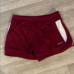 Adidas  NWT xs Women's Burgundy white striped Athletic climacool Shorts Photo 4