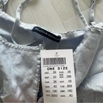 Brandy Melville  babydoll top Photo 6