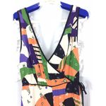 Urban Outfitters  Bold Patchwork Jumpsuit Crossover Deep V Size 4 Orange Black Photo 3