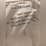 American Eagle outfitters White Ripped & distressed Stretch Mom Straight Jeans Photo 10