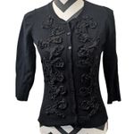 Evie. S Black Silk Blend Cardigan with 3D Rosette Ruffle Embellishments Photo 0