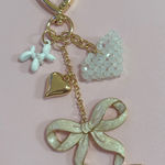 Gold and White Heart Charm Keychain Photo 0