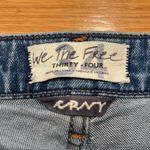 We The Free  button fly jean shirt size 34. Photo 1
