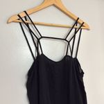 Free People  black strappy cutout flowy lace hem tank Photo 5