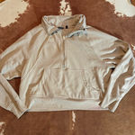 Danskin  beige cropped quarter zip size large  Photo 0