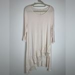 Blush Noir : Asymmetrical Hem Creme Tunic with Delicate Lace details. Photo 0