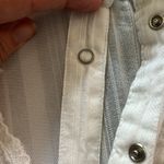 Guess size small long sleeve lace with pearl snap down. GUC. Photo 2