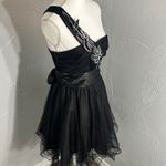 Teeze Me  Black One Shoulder Dress with White Floral Accent Photo 3