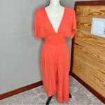 Lulus Spend Some Time Coral Smocked Short Sleeve Culotte Jumpsuit Medium Orange Photo 1