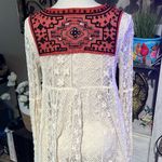 Free People  Cream Lace Top with burnt orange Embroidery size small Photo 4