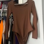 Amazon Brown Bodysuit Photo 0