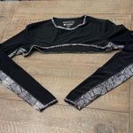 Coolibar Black and White Women's Crop swim top Photo 0