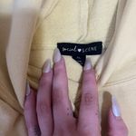 yellow smiley face hoodie Size XL Photo 2