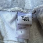 Disney Winnie The Pooh sweat shorts in size large. Photo 1