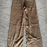 American Eagle  Super High-Rise Baggy Wide-Leg Jeans Photo 1