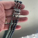 Boutique Three strand faux pearl layered necklace. Adjustable and easy. Photo 2