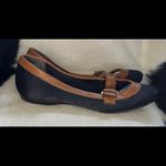 Nine West  Black slip-on shoes with a leather brown trim with a belt. Photo 2