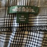 Wild Fable NWT--HOUNDSTOOTH DRESS-SIZE XS Adorable mini dress, black and white dress, adjustable straps, corset waist, back zipper, brand new, size xs Measurements: Bust: armpit to armpit 17 inches Waist: side to side 15 inches Length: shoulder seam to bottom 34 inches Photo 5