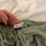 Adika Cropped Off Shoulder Long Sleeve Photo 2