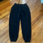 Lululemon black scuba joggers size 4 logo on leg Photo 2