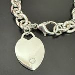 Unsigned Silver Photo 9