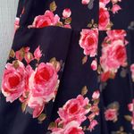 Navy floral romper with pleated pockets Photo 3