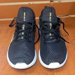 Nike  Black and Gold Sneakers Photo 3