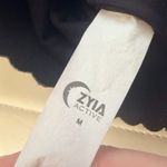 Zyia  activewear sports bra size
Medium black minimalist Photo 4
