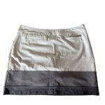 Adidas  skort size large white with gray stripe at bottom Photo 2
