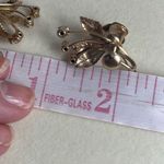 Vintage flower sprays climber earrings. Gold plated amber glass. Photo 3
