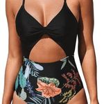 Cupshe NWT- Floral cutout bathing suit with adjustable straps, v neck floral one piece, top has padding, brand new never worn, size small Bust: 12-15 inches armpit to armpit Photo 0