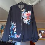 Chico's Chico’s Reversible Floral & Black and White Striped Bomber Jacket Sz 10 / 1 Photo 3
