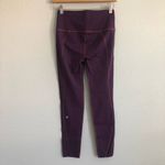 Lululemon  Eggplant with light purple stitching 7/8 Leggings. Size 6 Photo 3