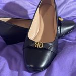Cole Haan  Elegant Black Heels with Gold Detail Photo 3