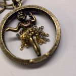 Signed SR Made In USA Costume Jewelry Bracelet With Spinning Hula Girl Charm Photo 1