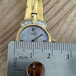 Citizen Eco-Drive Ladies Watch Crystals Pearl Dial Gold Tone Bracelet Solar Photo 7