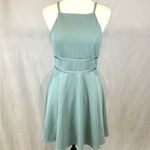 Trixxi light aqua blue peek a boo lace fit and flare dress size small. Photo 1